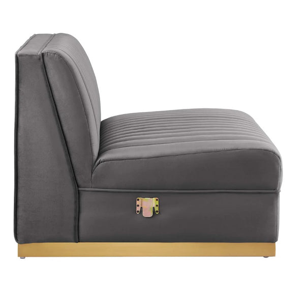 Sanchi 6PC Channel Tufted Velvet Modular Sectional Sofa Gray Gray upholstered chair with a gold base on a white background