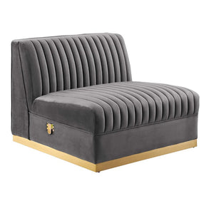 Sanchi 6PC Channel Tufted Velvet Modular Sectional Sofa Gray Gray upholstered chair with a gold base on a white background