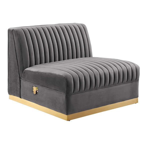 Sanchi 6PC Channel Tufted Velvet Modular Sectional Sofa Gray Gray upholstered chair with a gold base on a white background