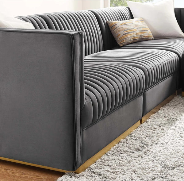 Sanchi 4PC Channel Tufted Velvet Modular Sectional Sofa Gray Gray ribbed sofa with a textured surface in a living room setting.