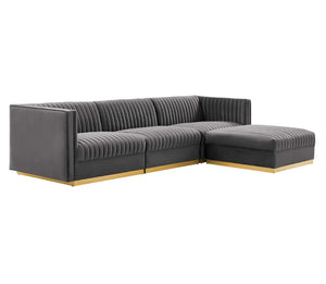 Sanchi 4PC Channel Tufted Velvet Modular Sectional Sofa Gray Gray sectional sofa with gold accents on a white background