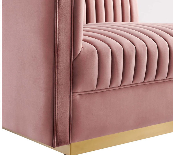 Sanchi 4PC Channel Tufted Velvet Modular Sectional Sofa Rose Close-up of a pink velvet chair with a gold base on a white background