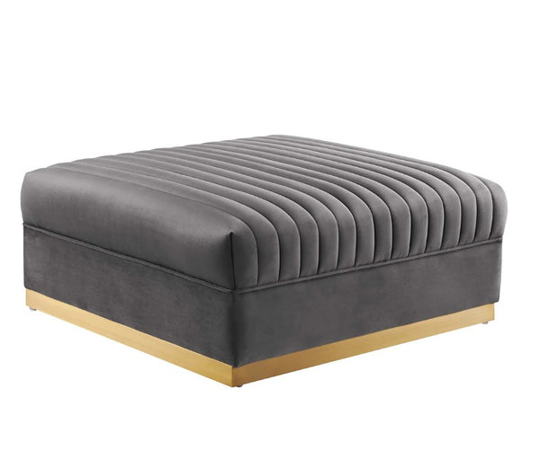 Sanchi 6PC Channel Tufted Velvet Modular Sectional Sofa Gray Gray ottoman with a ribbed texture on a white background