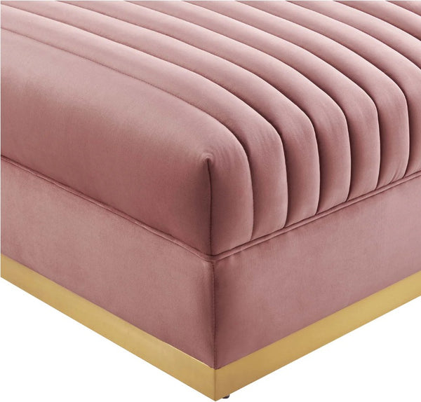 Sanchi Channel Tufted Velvet Modular Sectional Sofa Ottoman Pink upholstered bench with a gold base on a white background