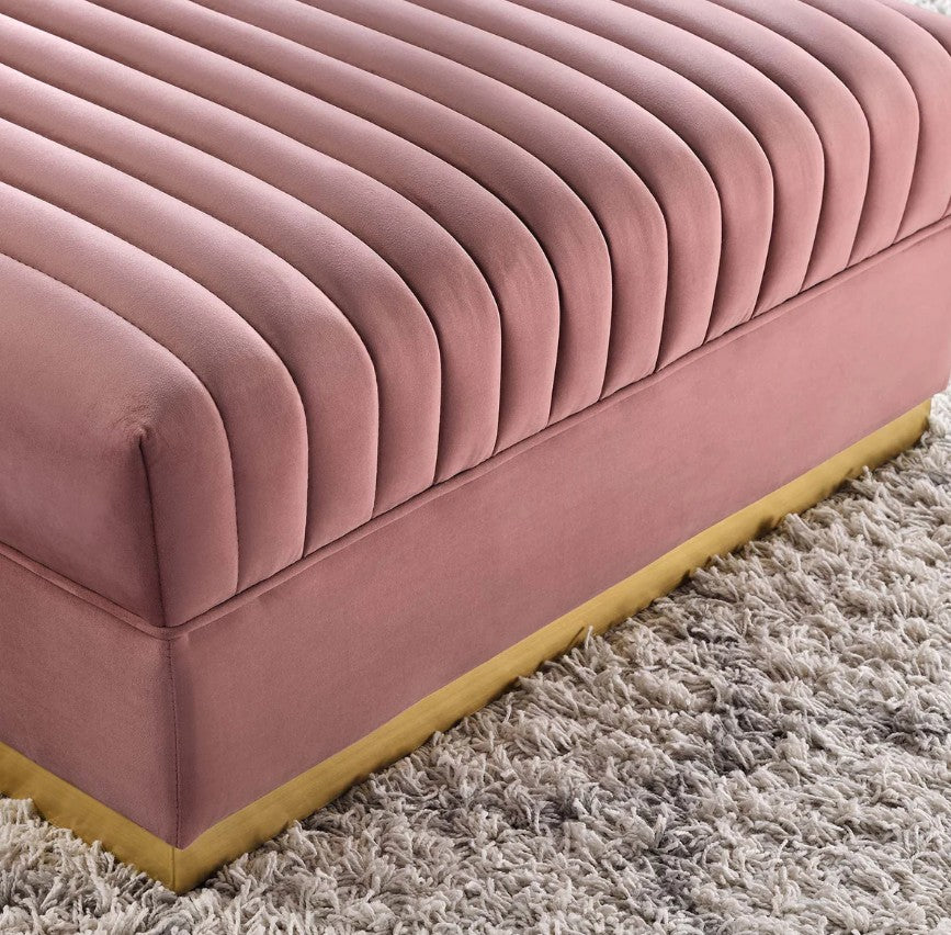 Sanchi Channel Tufted Velvet Modular Sectional Sofa Ottoman Pink ottoman in a room with a window, plant, and side table.