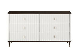 Serania Two Tone Dresser A modern six-drawer dresser with white vertically ribbed drawer fronts, slim silver handles, and a dark brown top and legs, shown on a plain white background.