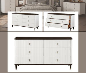Serania Two Tone Dresser A white dresser with a dark wood top and legs, featuring vertical drawer fronts and small metallic handles. The image includes a large main product view at the bottom and two smaller inset views at the top showing the dresser in a bedroom setting and one drawer pulled open.
