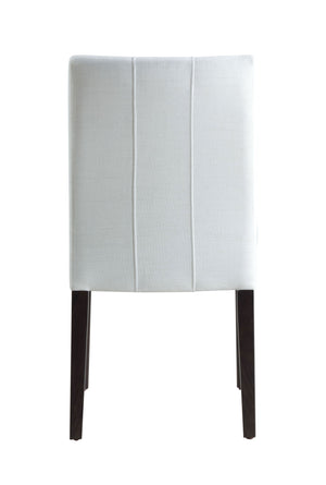 Serania Two Tone Dining Table Chair A modern dining chair with a white upholstered backrest featuring three vertical channel tufting details and dark brown wooden legs, shown against a plain white background.
