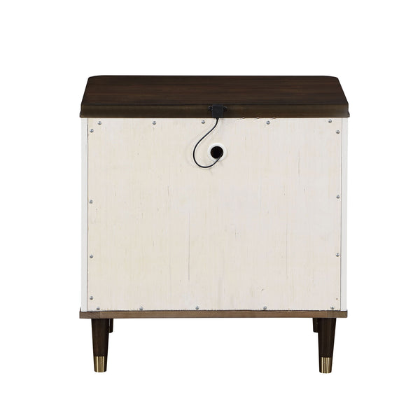 Serania Two Tone Nightstand A modern storage chest or side table with a dark brown wood top and legs, and a distressed off-white front panel. The front features a circular cutout with a black cord running through it, secured by small metal screws.