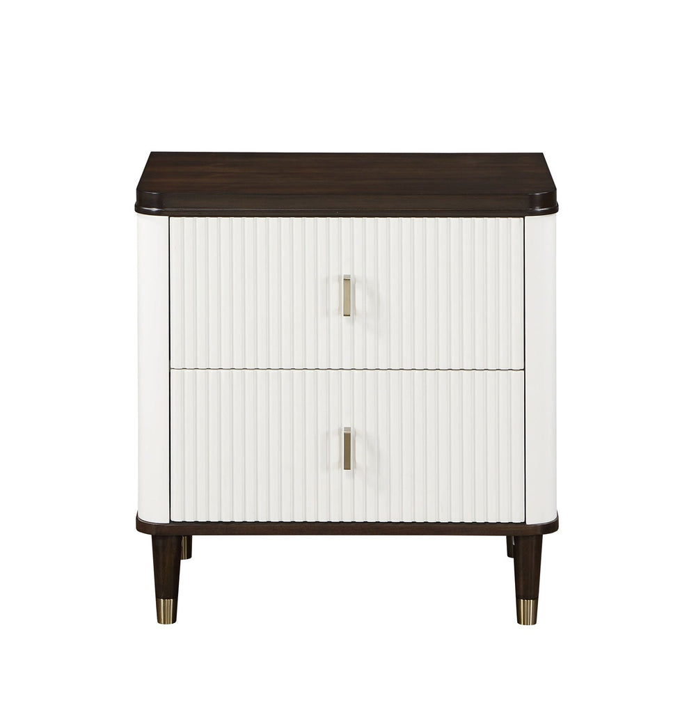 Serania Two Tone Nightstand White nightstand with dark wood top next to a bed in a bedroom.