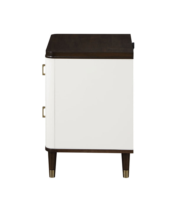 Serania Two Tone Nightstand A modern two-drawer nightstand with a white front, dark brown wood top and legs, and brass hardware, shown from a side angle on a white background.