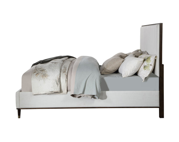 Serania Two Tone Upholstered Bed Bed with white bedding and decorative pillows on a white background