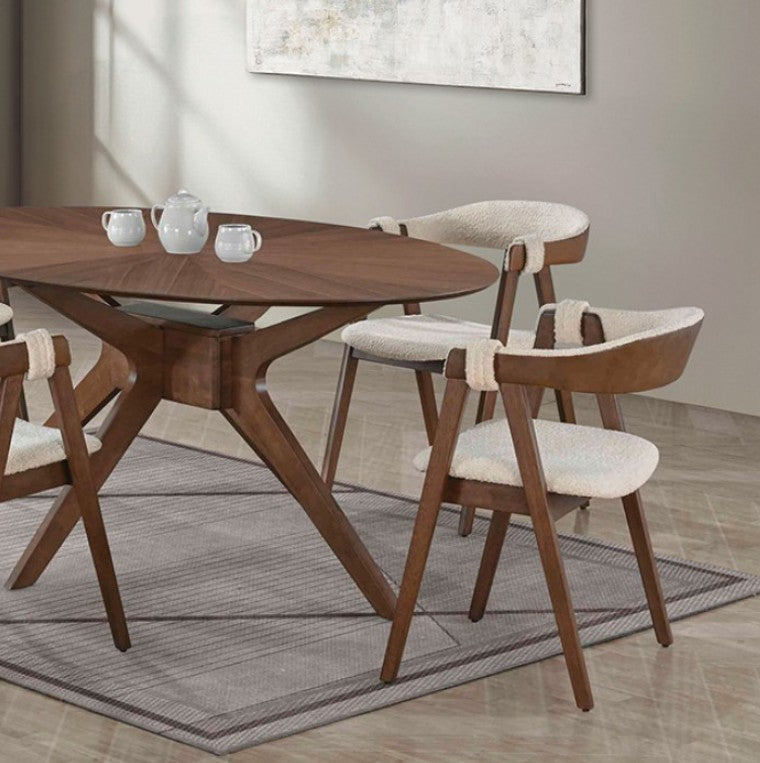 Serika Mid Century Modern Oval Walnut Dining Table Dining room with wooden table and chairs in a well-lit room.