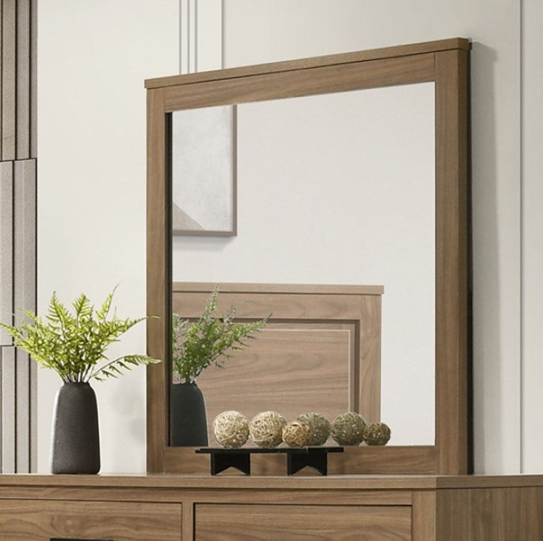 Serranto Walnut Finish Mirror Wooden mirror on a dresser with decorative items and plants.