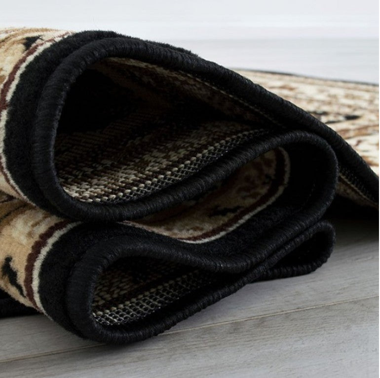 Shotta Traditional Style 5x8 Brown Area Rug Decorative rug with intricate patterns on a black background