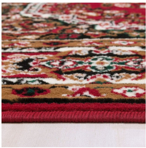 Shotta Traditional Style 5x8 Red Area Rug Close-up of a colorful patterned rug with a red border.