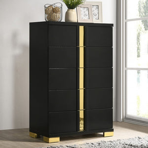 Shysko Black Gold Contemporary Style Chest A modern black 5-drawer chest of drawers with vertical gold metallic accents on the center divider and feet, styled in a room setting next to a window.