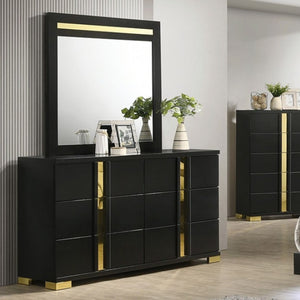 Shysko Black Gold Contemporary Style Dresser A modern black dresser with a matching rectangular mirror, featuring vertical gold metallic accents and gold feet, styled in a contemporary bedroom setting.