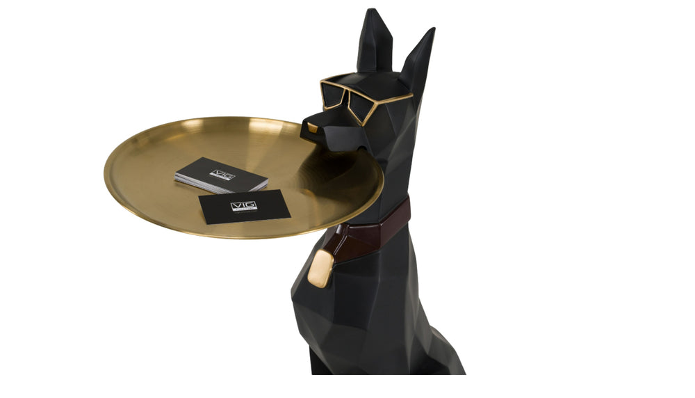 Skippy Modern Black and gold Cool Dog Sculpture A black geometric dog-shaped side table or tray holder with gold-tone accents, including a tray on its head, photographed on a clean white background.