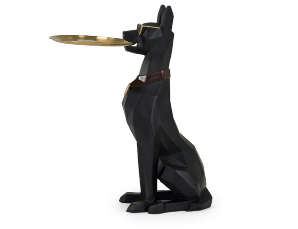 Skippy Modern Black and gold Cool Dog Sculpture A black geometric dog figurine holding a round gold tray in its mouth, with a brown collar detail, shown against a plain white background.