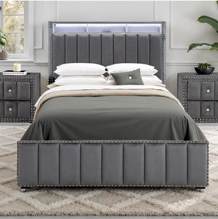 Sluvender Modular Upholstered Nightstand Dark Gray Finish Gray nightstand with studded details next to a bed