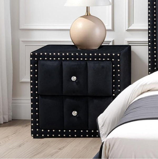 Sluvender Modular Upholstered Nightstand Black Finish Black nightstand with studded details next to a bed in a bedroom setting