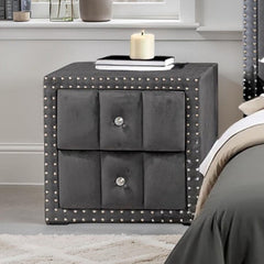 Sluvender Modular Upholstered Nightstand Dark Gray Finish Gray nightstand with studded details next to a bed