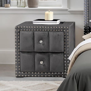 Sluvender Modular Upholstered Nightstand Dark Gray Finish Gray nightstand with studded details next to a bed