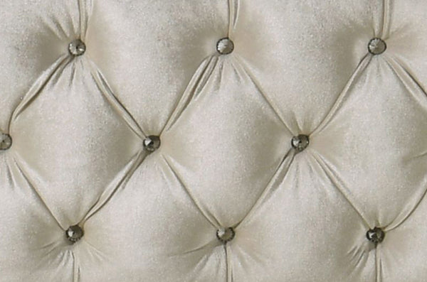Sonya Beige Velvet Upholstered Traditional Style Bed Close-up of a tufted beige fabric with button details