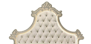 Sonya Beige Velvet Upholstered Traditional Style Bed An ornate tufted headboard with carved scrollwork and nailhead trim, shown against a plain white background.