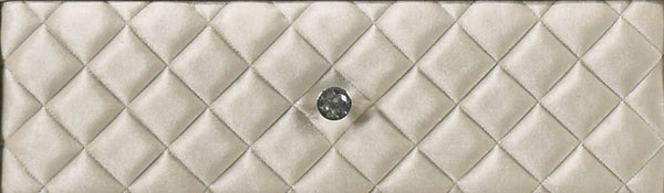Sonya Beige Velvet Upholstered Traditional Style Dresser A close-up of a quilted cream-colored leather clutch or wallet with a central silver-tone button closure.
