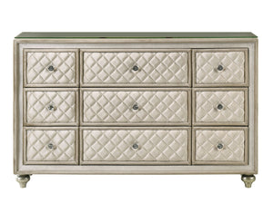 Sonya Beige Velvet Upholstered Traditional Style Dresser A nine-drawer dresser with quilted cream drawers, a distressed gray-beige frame, and a green top surface, shown against a plain white background.