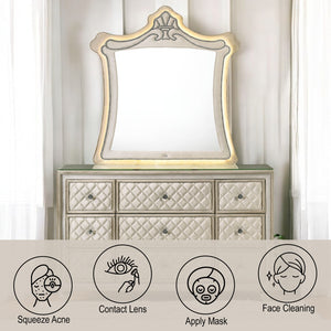 Sonya Beige Velvet Upholstered Traditional Style Mirror Decorative mirror on a dresser with icons at the bottom indicating uses like squeezing acne, wearing contact lenses, applying a mask, and face cleaning.