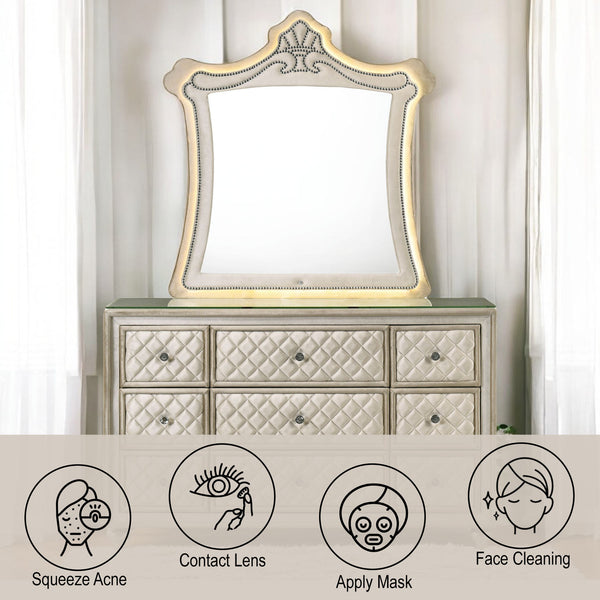 Sonya Beige Velvet Upholstered Traditional Style Mirror Decorative mirror on a dresser with icons at the bottom indicating uses like squeezing acne, wearing contact lenses, applying a mask, and face cleaning.