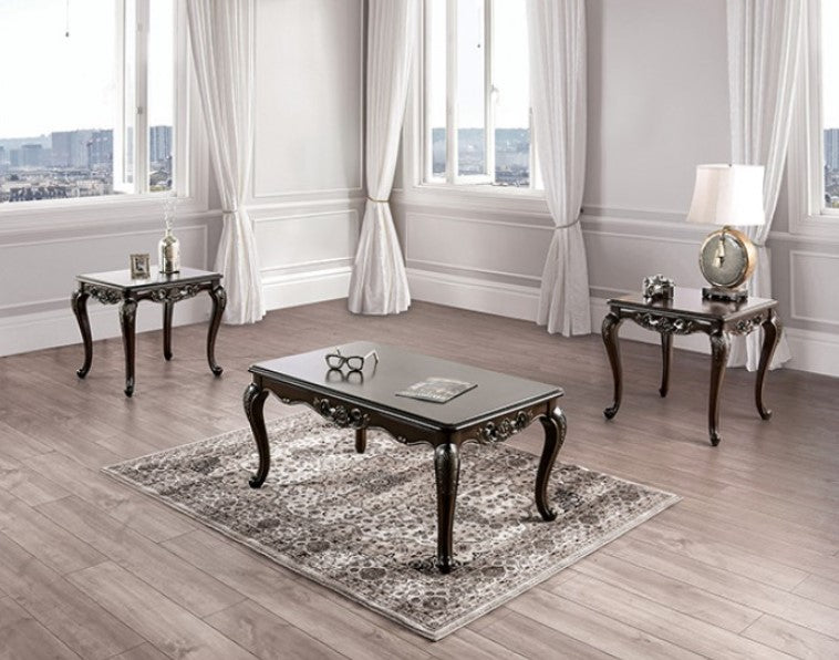Spencer Solid Wood Traditional Coffee Table Decorative dark wood coffee table with ornate legs on a patterned rug.