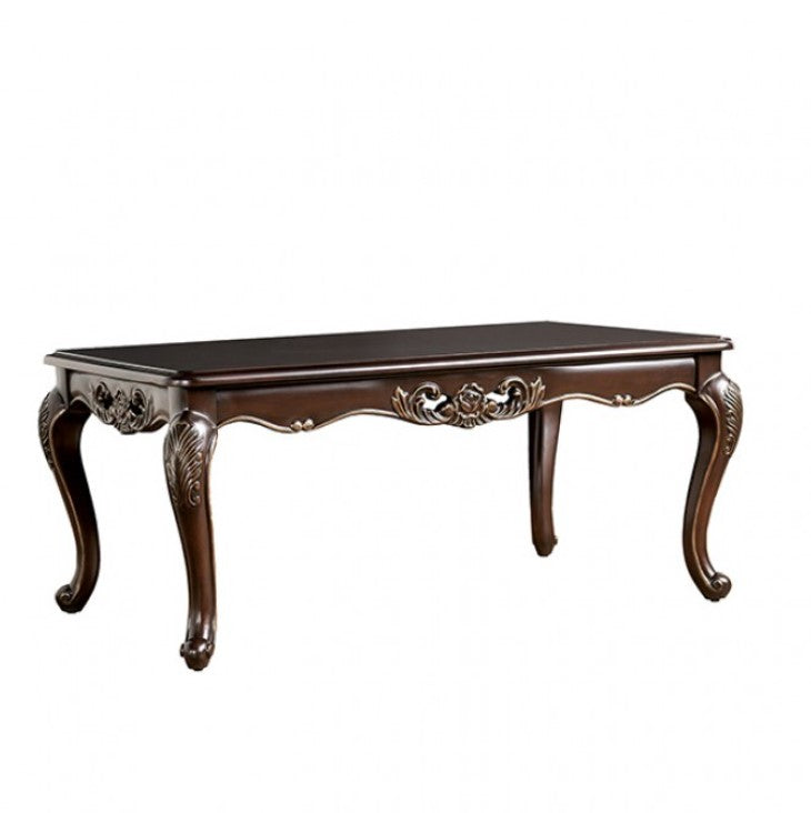 Spencer Solid Wood Traditional Coffee Table Decorative dark wood coffee table with ornate legs on a patterned rug.