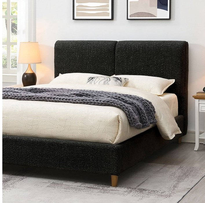 Doira Modern  Style Upholstered Bed Black Finish Black upholstered bed with white bedding and gray blanket in a bedroom setting.