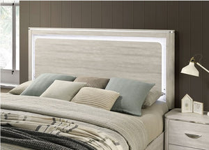 Sundy Curved Edge Dusty Gray Bed Bedroom with a bed featuring pillows and a nightstand.