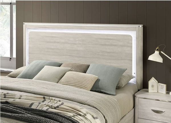 Sundy Curved Edge Dusty Gray Bed Bedroom with a bed featuring pillows and a nightstand.