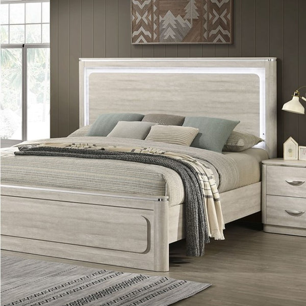 Sundy Curved Edge Dusty Gray Bed Neatly made bed with gray bedding in a bedroom setting.