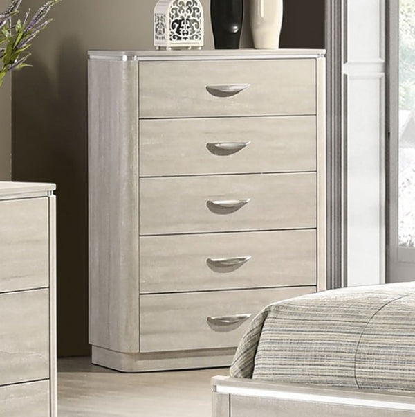 Sundy Curved Edge Dusty Gray Chest Beige dresser with five drawers in a bedroom setting.