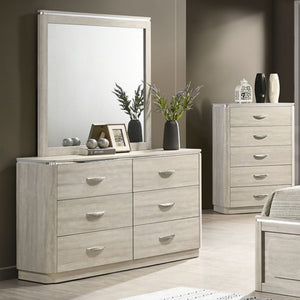 Sundy Curved Edge Dusty Gray Dresser Light wood dresser with mirror and decorative items in a bedroom setting