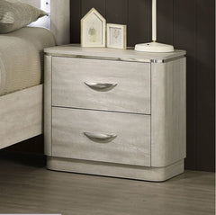 Sundy Curved Edge Dusty Gray Nightstand Gray nightstand with two drawers in a bedroom setting