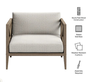 Sunshore Pebble Outdoor Armchair Chair with sturdily constructed teak wood frame, slatted seat base, weather-resistant cushions, and assembly required text.