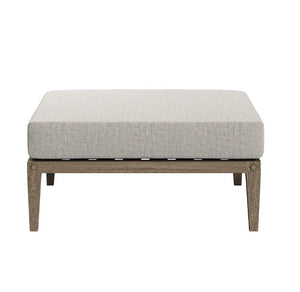 Sunshore Pebble Outdoor Ottoman Square ottoman with a light gray cushion on a white background