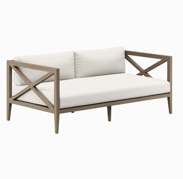 Sunshore Weathered Gray Outdoor Loveseat Sofa with wooden frame and white cushions on a white background