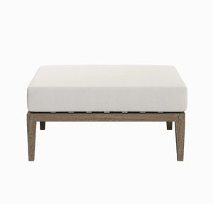 Sunshore Weather Gray Outdoor Ottoman Square ottoman with a white cushion on a white background