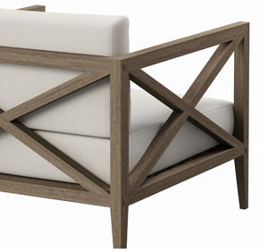 Sunshore Weathered Gray Outdoor Armchair Section of a sofa with wooden frame and white cushions on a white background