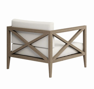 Sunshore Weathered Gray Outdoor Armchair Wooden armchair with white cushions on a white background