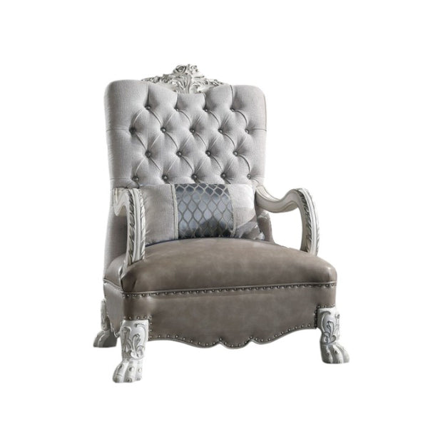 Traditional Style Armchair Bone White Dresden Collection A luxury wingback armchair with a tufted light gray velvet backrest, a distressed brown leather seat cushion, ornate silver-painted carved wooden arms and legs, and a decorative patterned accent pillow, shown against a plain white background.